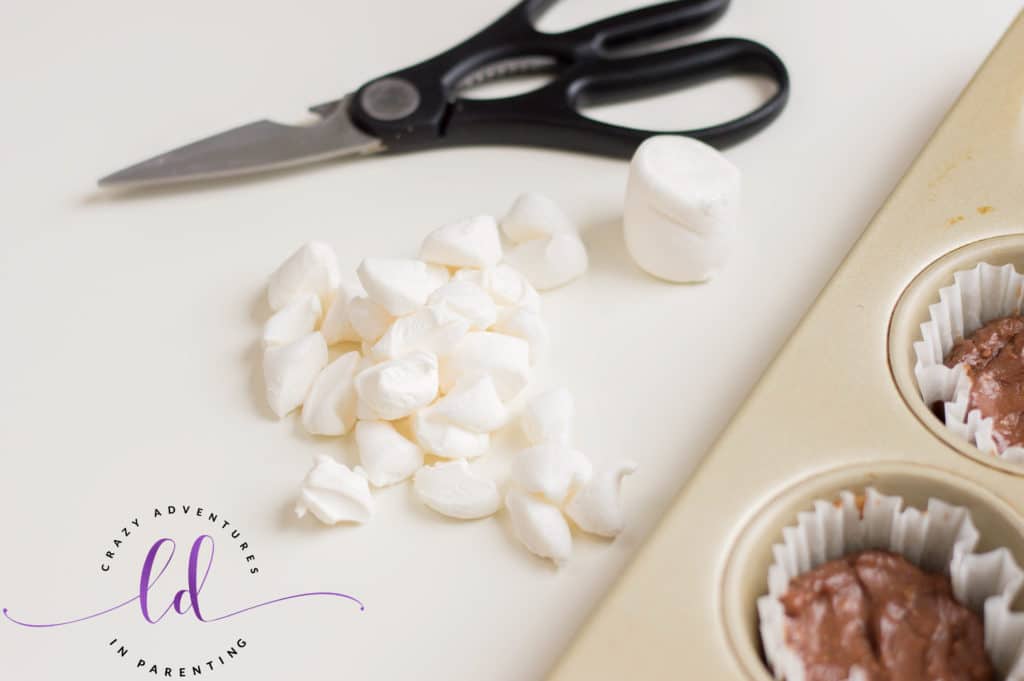 Cut Up Marshmallow to Make S'mores Mini Cheesecakes